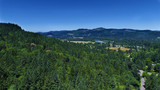 Fototapeta Na ścianę - Aerial view of the Oregon countryside, McKenzie River in the distance