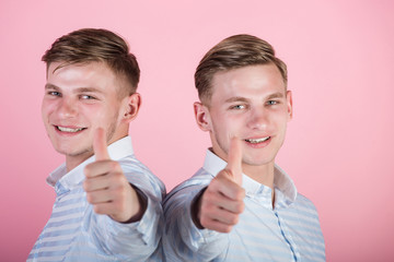 Twins wearing blue shirts