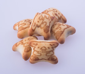 cookies or homemade cookies in shape of bears on background.