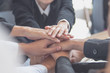 © sticker2you - Concept of teamwork. business people joined hands