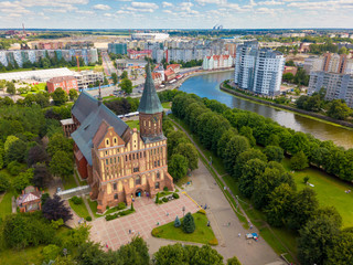 Wall Mural - Aerial cityscape of Kant Island in Kaliningrad, Russia at sunny summer day with white clouds in the blue sky