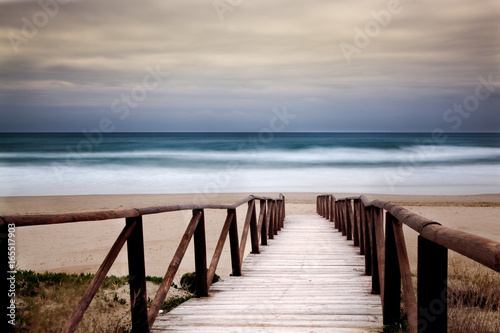 Fotomural Paesaggio marino con passaggio dalla spiaggia al mare