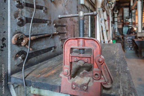 Fotografia, Obraz vice on a workbench in abandoned steam plant factory