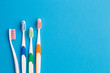 Multi-colored toothbrushes, space for text