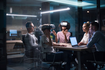 multiethnic business team using virtual reality headset
