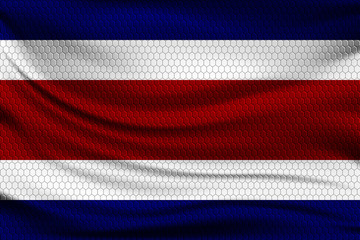 Sticker - National flag of Costa Rica on wavy fabric with a volumetric pattern of hexagons. Vector illustration.