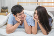 © CasanoWa Stutio - Young couple sleeping and relaxing on the bed in bedroom