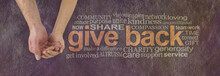 Please Donate To Our Cause - Campaign Banner With Female Hand Holding Male Cupped Hand On Left And A GIVE BACK Word Cloud  On Right Against A Rustic Parchment Background
