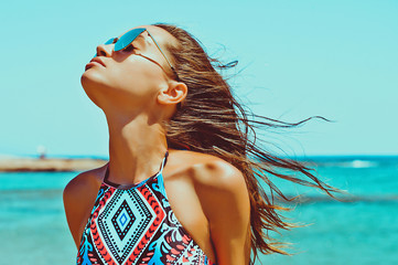 Beautiful happy  woman at sea