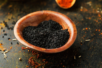 Poster - Black sesame in a bowl on a dark