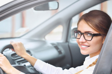 Portrait of a businesswoman siting in the car