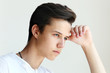 © Pavel Kubarkov - Thoughtful young man with hand