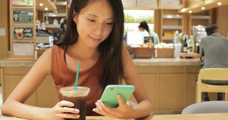 Poster - Woman use of smart phone in coffee shop