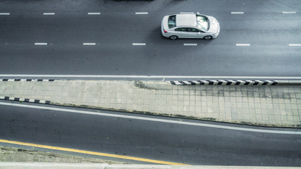 top aerial view of road and street pedestrian with the car in the city.