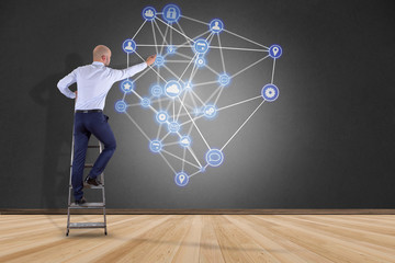 Poster - businessman in front of a wall with a business network connection displayed on a futuristic interfac