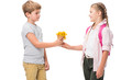 © LIGHTFIELD STUDIOS - cute boy presenting waffle cone with yellow flowers to adorable smiling girl isolated on white