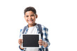 © LIGHTFIELD STUDIOS - cute african american boy holding digital tablet and smiling at camera isolated on white
