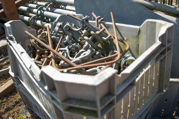 Rusty iron in a crate