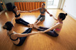 © DragonImages - Cheerful Women Focused on Training