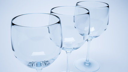 3d render of closeup of three wine glasses in row with blue light