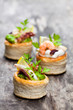 Vol-au-vents  puff pastry cases filled with salted squid and octopus