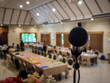 © skarie - Close up of microphone in concert hall or conference room