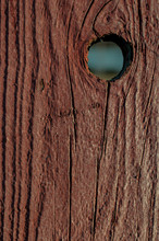 Hole Top Corner Of Wooden Brown Fence