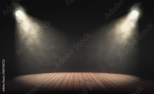 Fotografía Spotlights illuminate empty stage with dark background