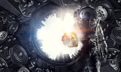 Wall Mural - astronaut in fantasy world. mixed media