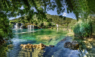 Wall Mural - Panoramic View of waterfall Skradinski Buk in Krka National Park one of the most famous national parks and visited by many tourists.Skradinski Buk:KRKA NATIONAL PARK,CROATIA,MAY 27,2017