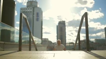 Wall Mural - Sporty senior man jogging in the city