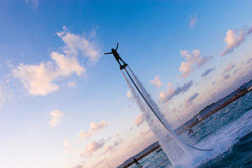 Wall Mural - Flyboard | Fly over the water