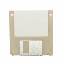 Top View Of A Beige Vintage Floppy Disk On White Background