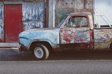 Old Colorful Vintage Truck In Poor Condition