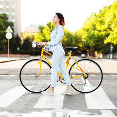 Lovely woman woman with a bicycle