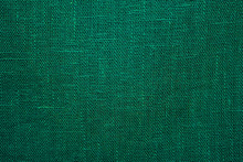 Green Linen Cloth Close-up Background. Fabric Khaki Teak Canvas Texture.
