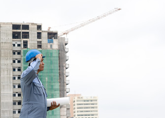 construction supervisor with building back ground