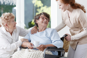 Sticker - Nurse helps senior woman