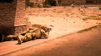 Canvas Print - Soldiers in action in conflict zone