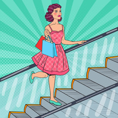 Wall Mural - Pop Art Beautiful Woman with Shopping Bags on Escalator. Sale Consumerism. Vector illustration