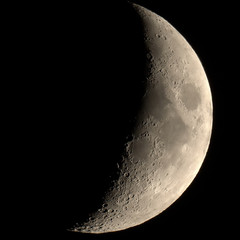 Wall Mural - waxing crescent moon seen with telescope