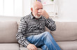 © Prostock-studio - Elderly man with headache pinching back of nose