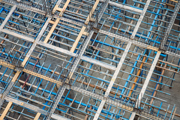 Metal scaffold set up for heavy building construction from above angle.