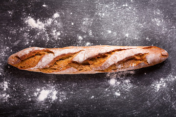 Sticker - fresh bread on a dark table