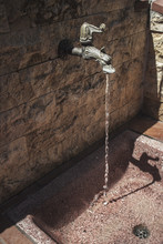 Vertical View Of A Old Water Tap