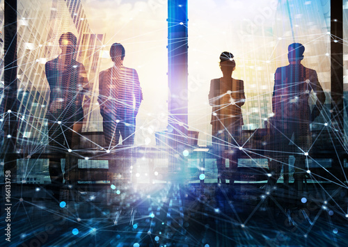 Fotografie, Obraz Group of business partner looking for the future with network digital effect