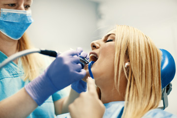 Wall Mural - Woman in Dentist Office