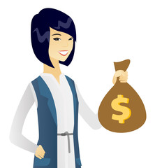 Canvas Print - Young asian business woman holding a money bag.