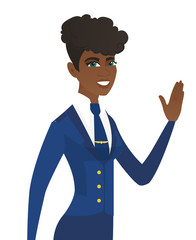 Sticker - Young african-american stewardess waving her hand.