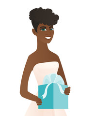 Poster - Woman in a white bridal dress holding a gift box.